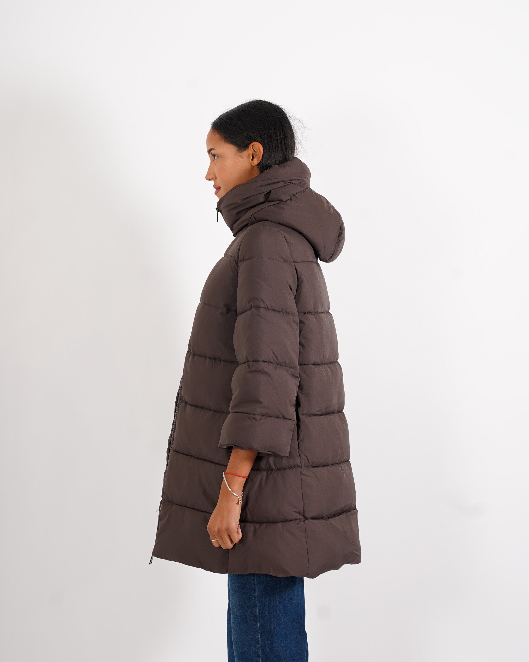 Piumino trapuntato con cappuccio, tasche a filo e chiusura con zip - Carla