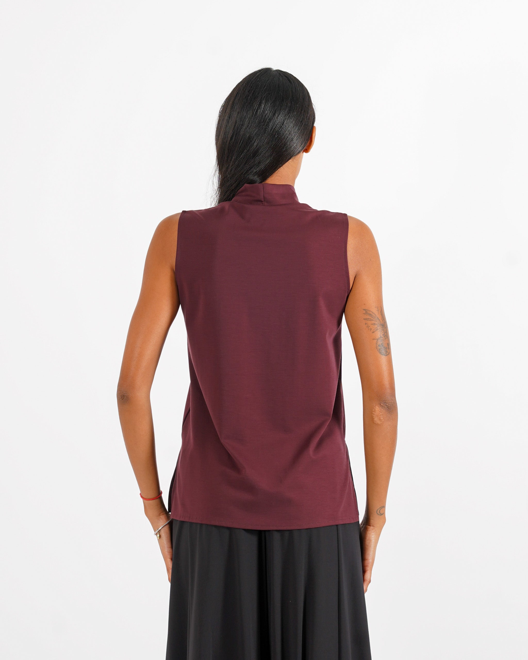 Blusa smanicata collo alto - Avventurosa