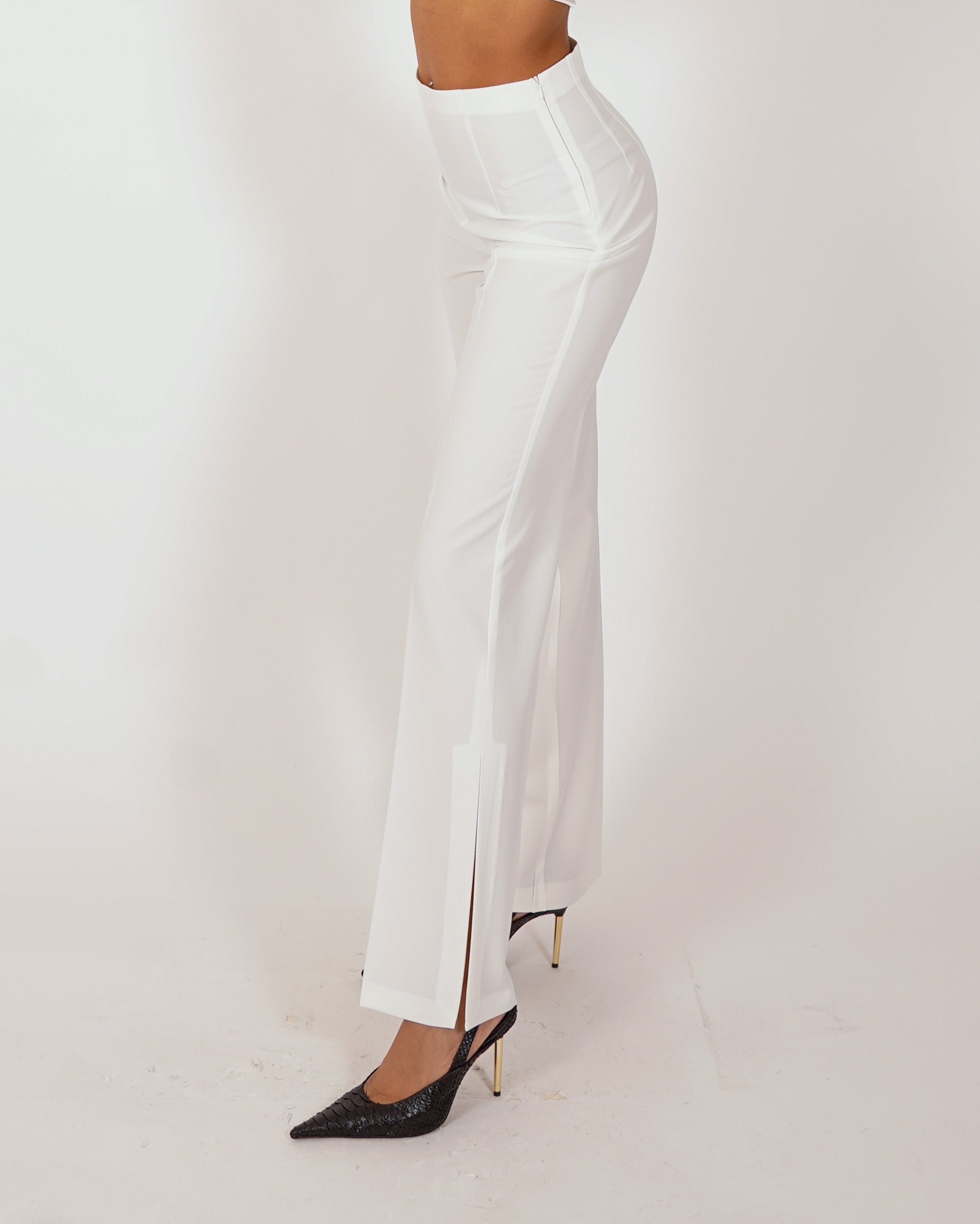 Pantaloni slim fit con spacco sul fondo - Zodiaco