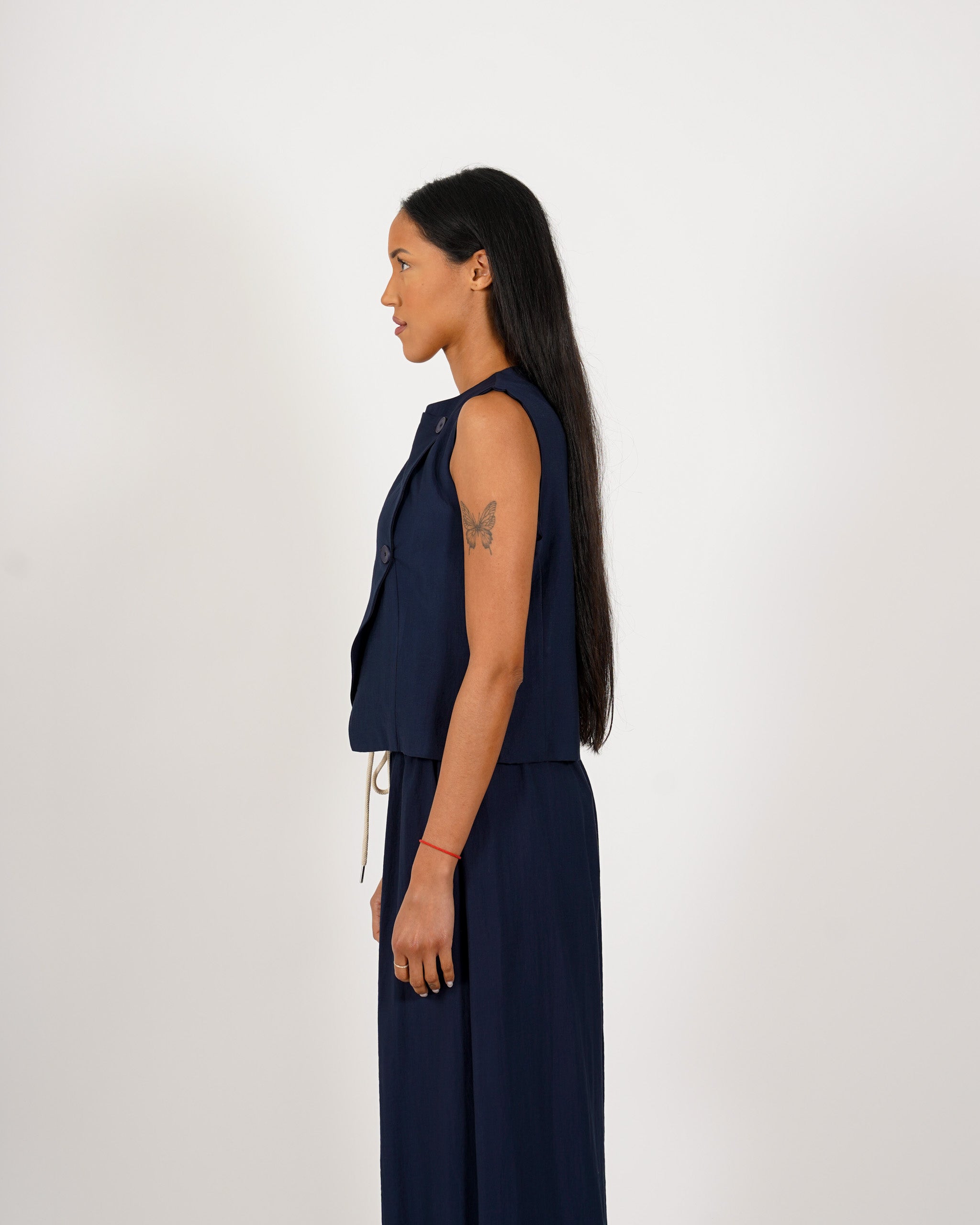 Gilet monopetto con chiusura laterale - Precisa