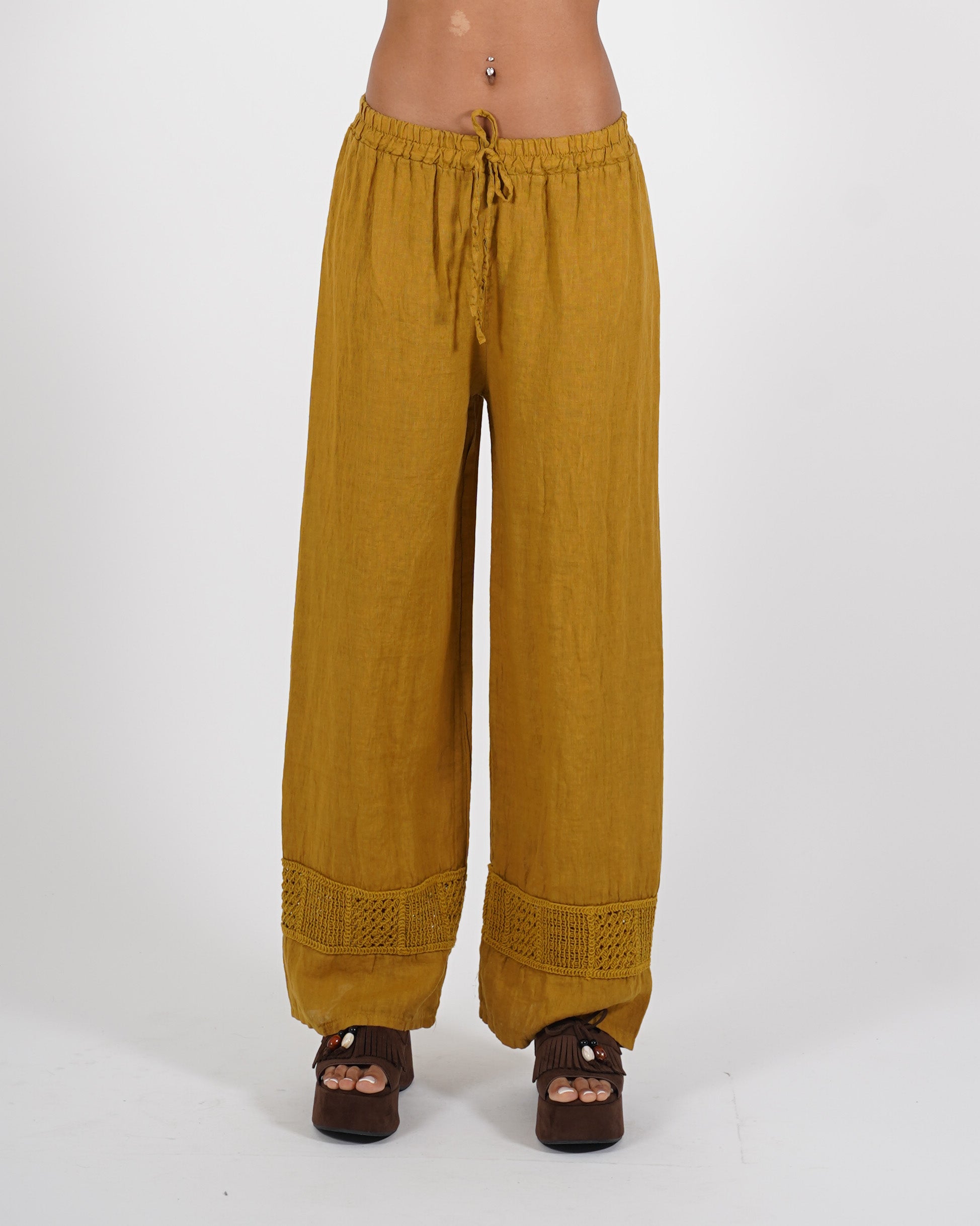 Pantaloni in lino con ricamo sul fondo - Caneira