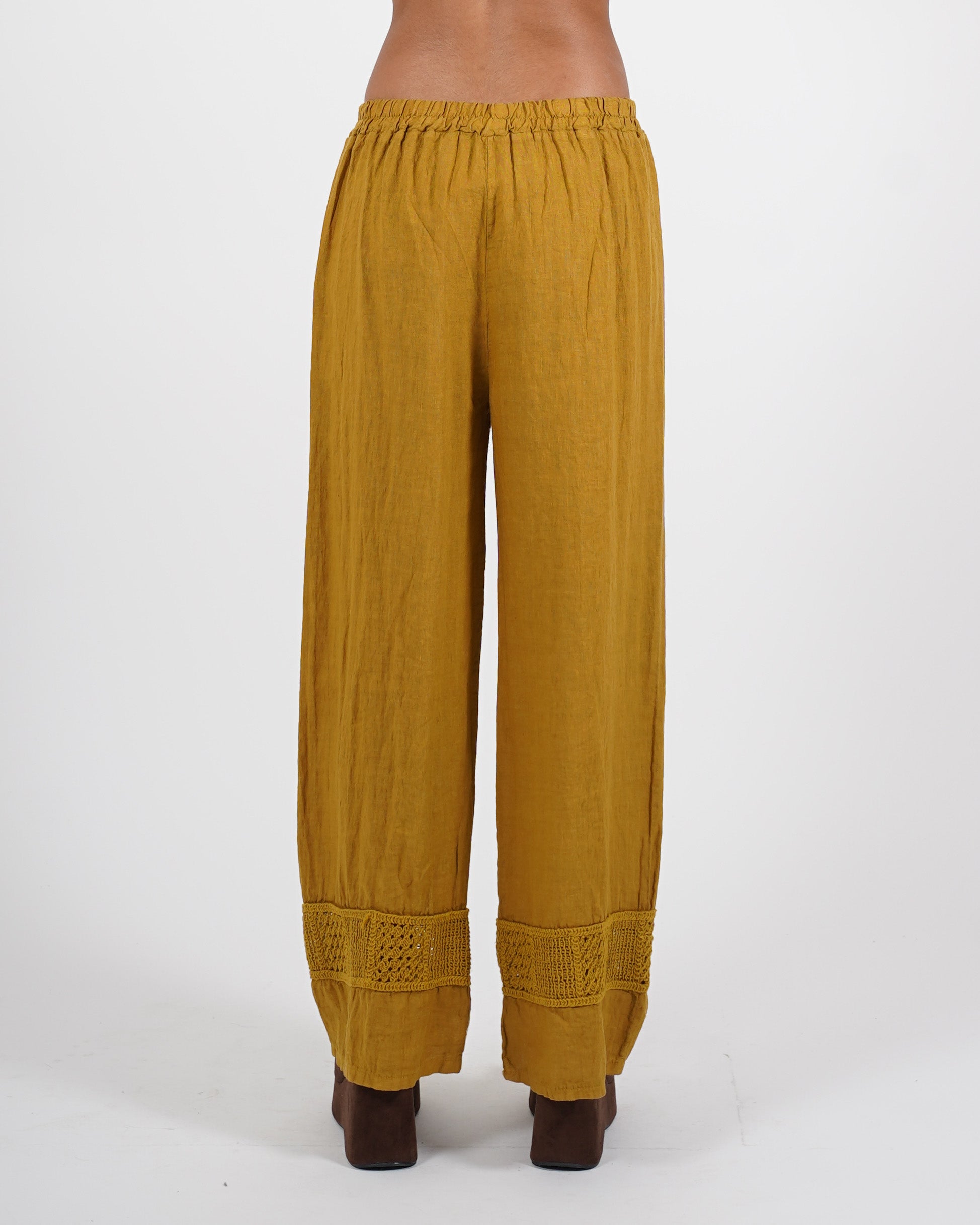 Pantaloni in lino con ricamo sul fondo - Caneira