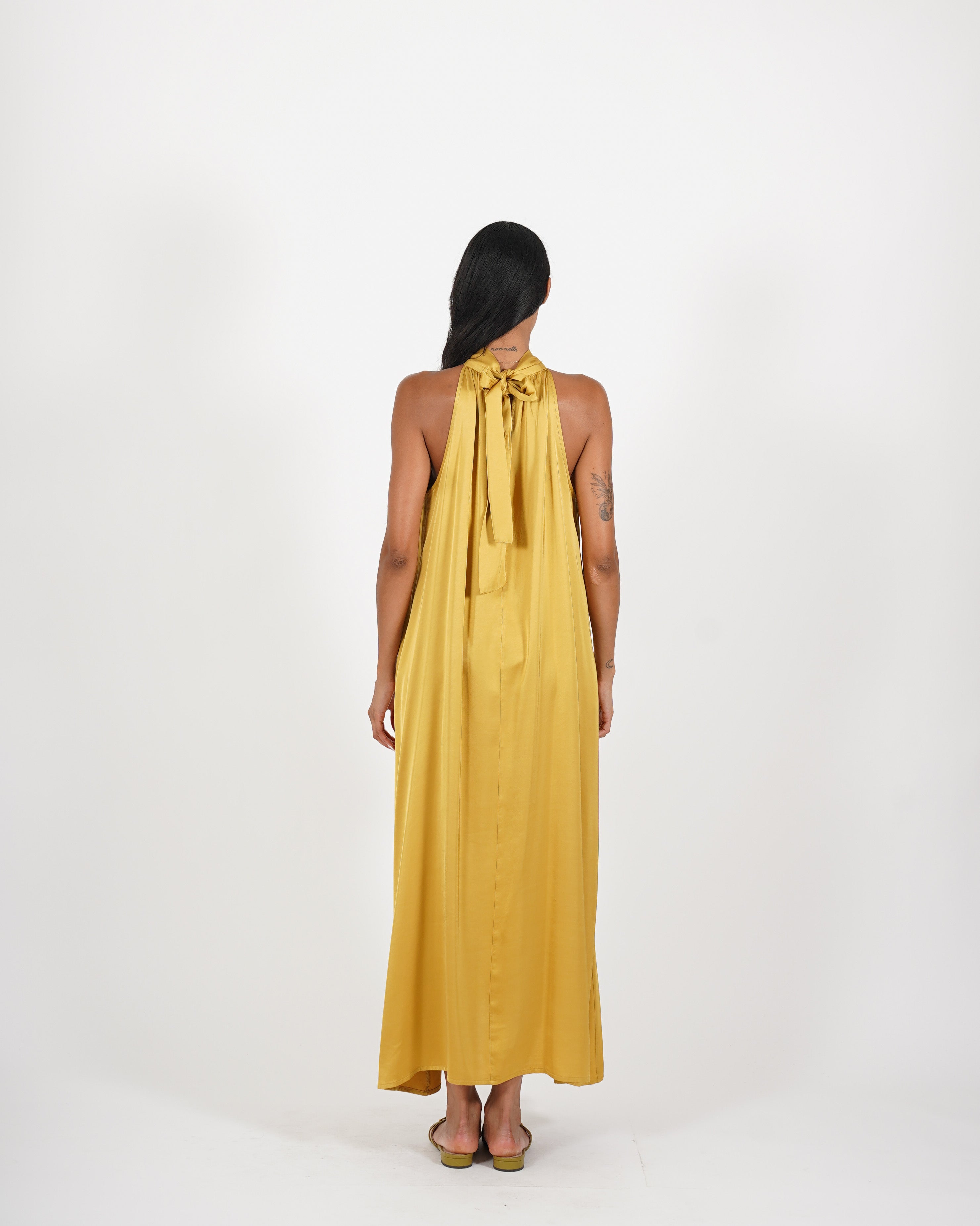 Abito smanicato con fiocco sul retro - Elastica
