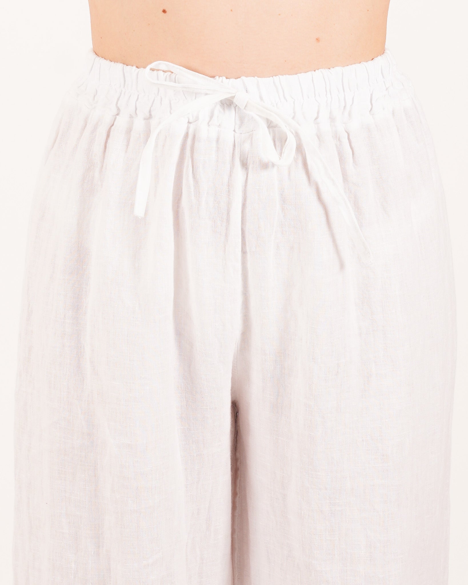 Pantaloni con elastico e passamaneria sul fondo - Caneira