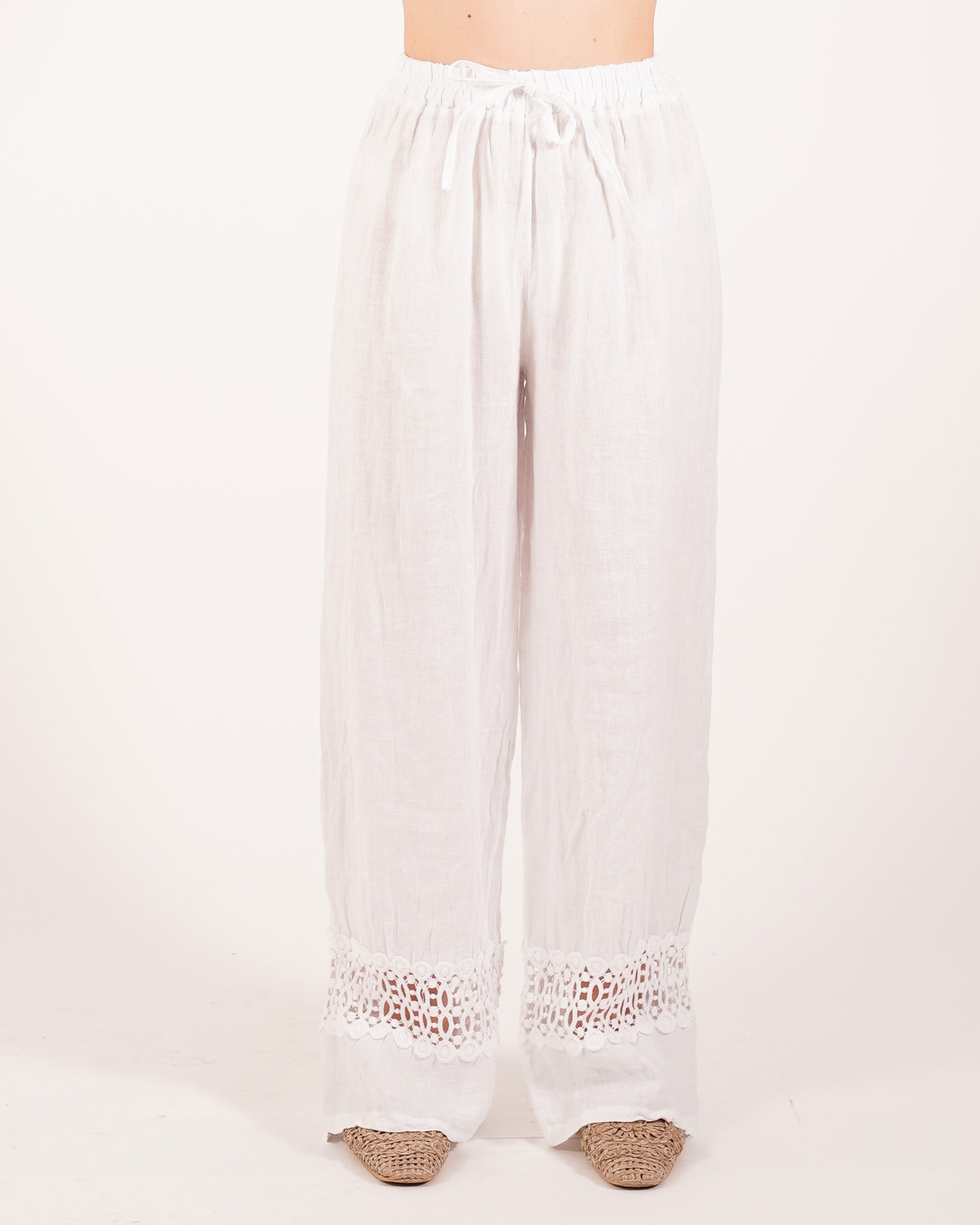 Pantaloni con elastico e passamaneria sul fondo - Caneira
