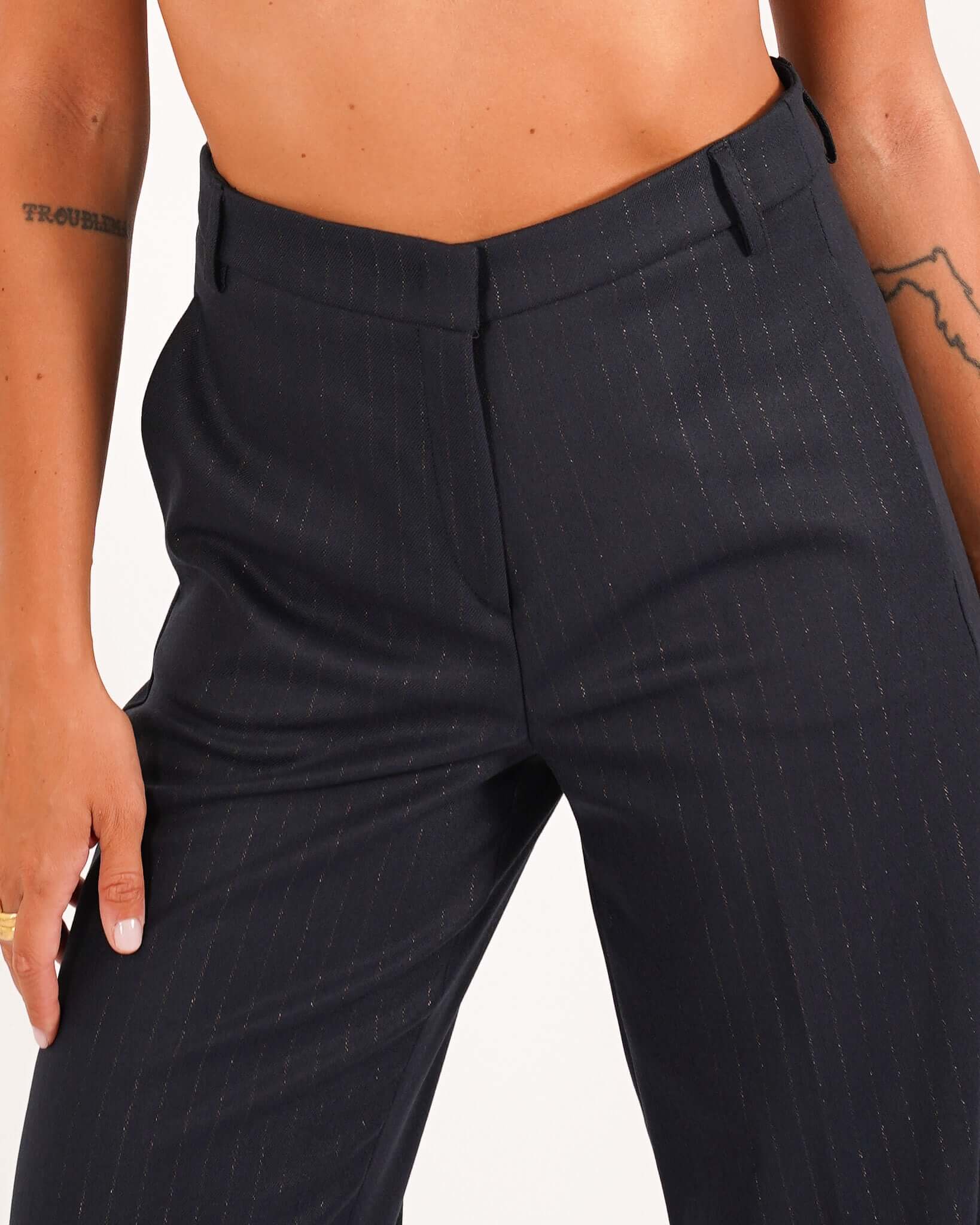 Pantaloni palazzo gessati a vita alta in ecofibra – Giovanna