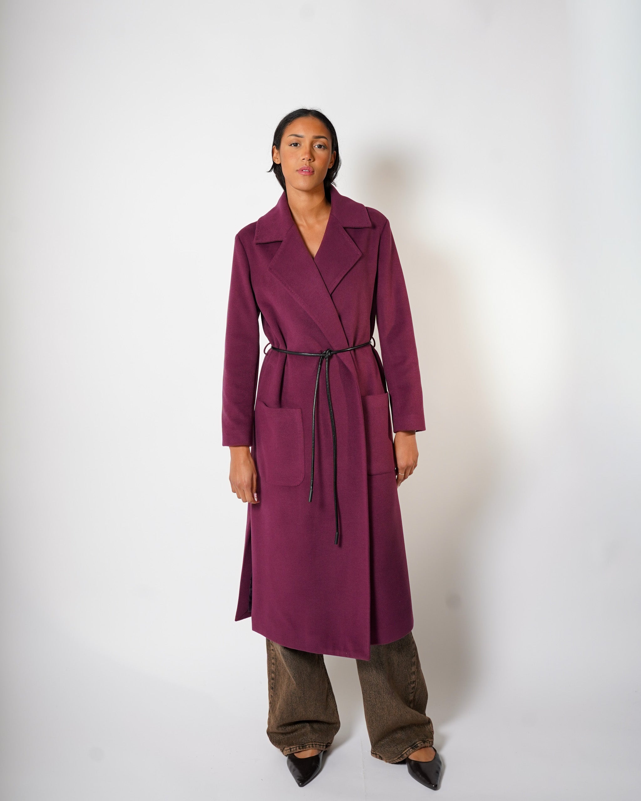 Cappotto lungo con cintura a filo in ecopelle e tasche davanti - Tricot