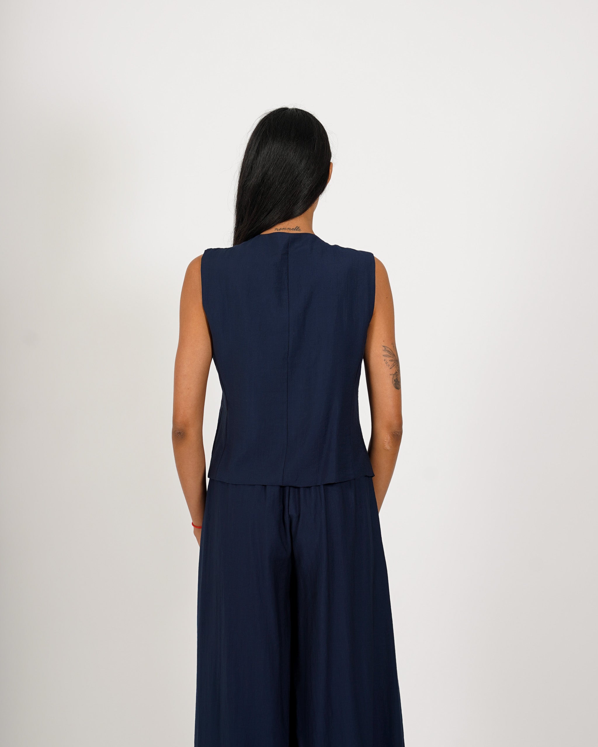 Gilet monopetto con chiusura laterale - Precisa