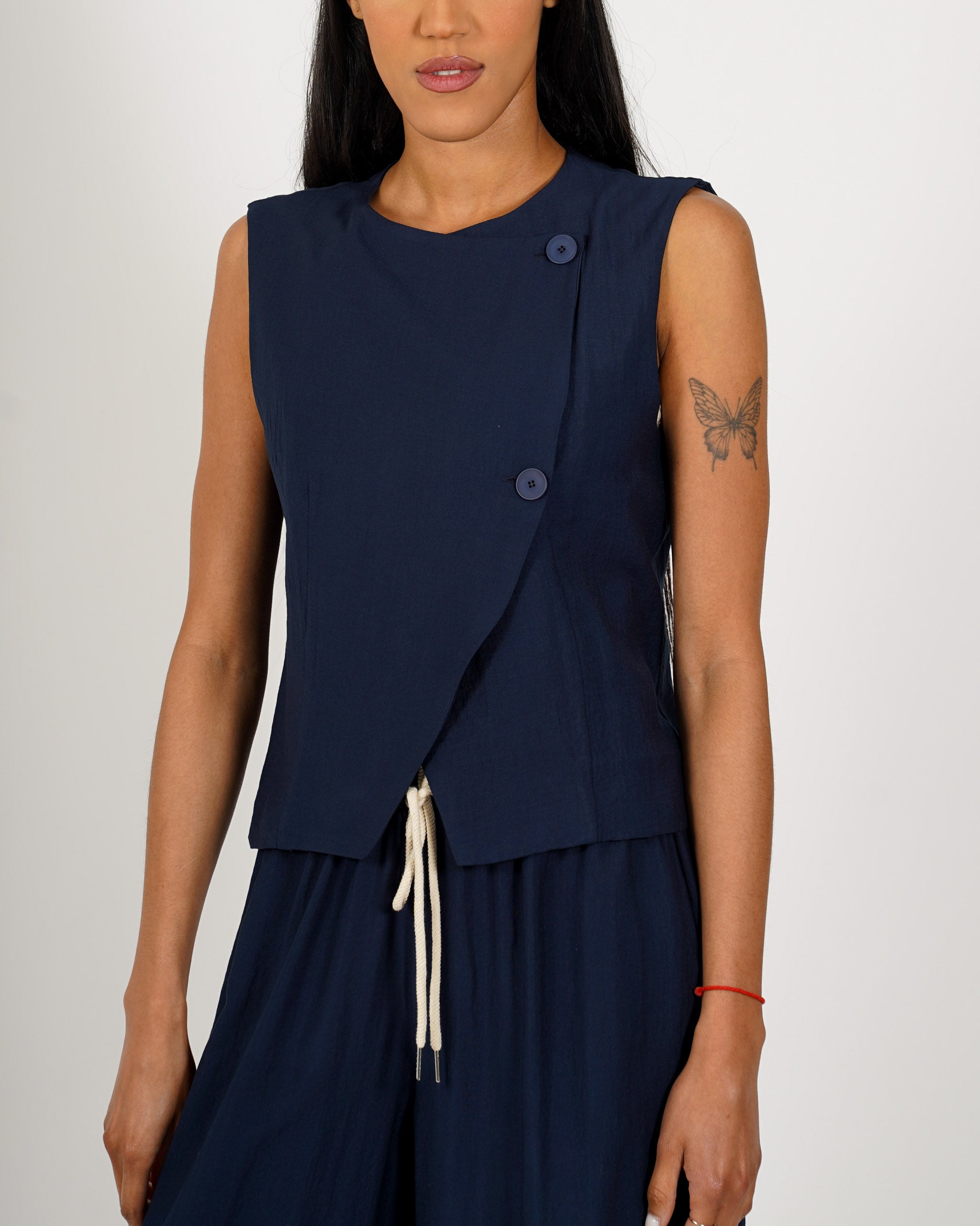 Gilet monopetto con chiusura laterale - Precisa