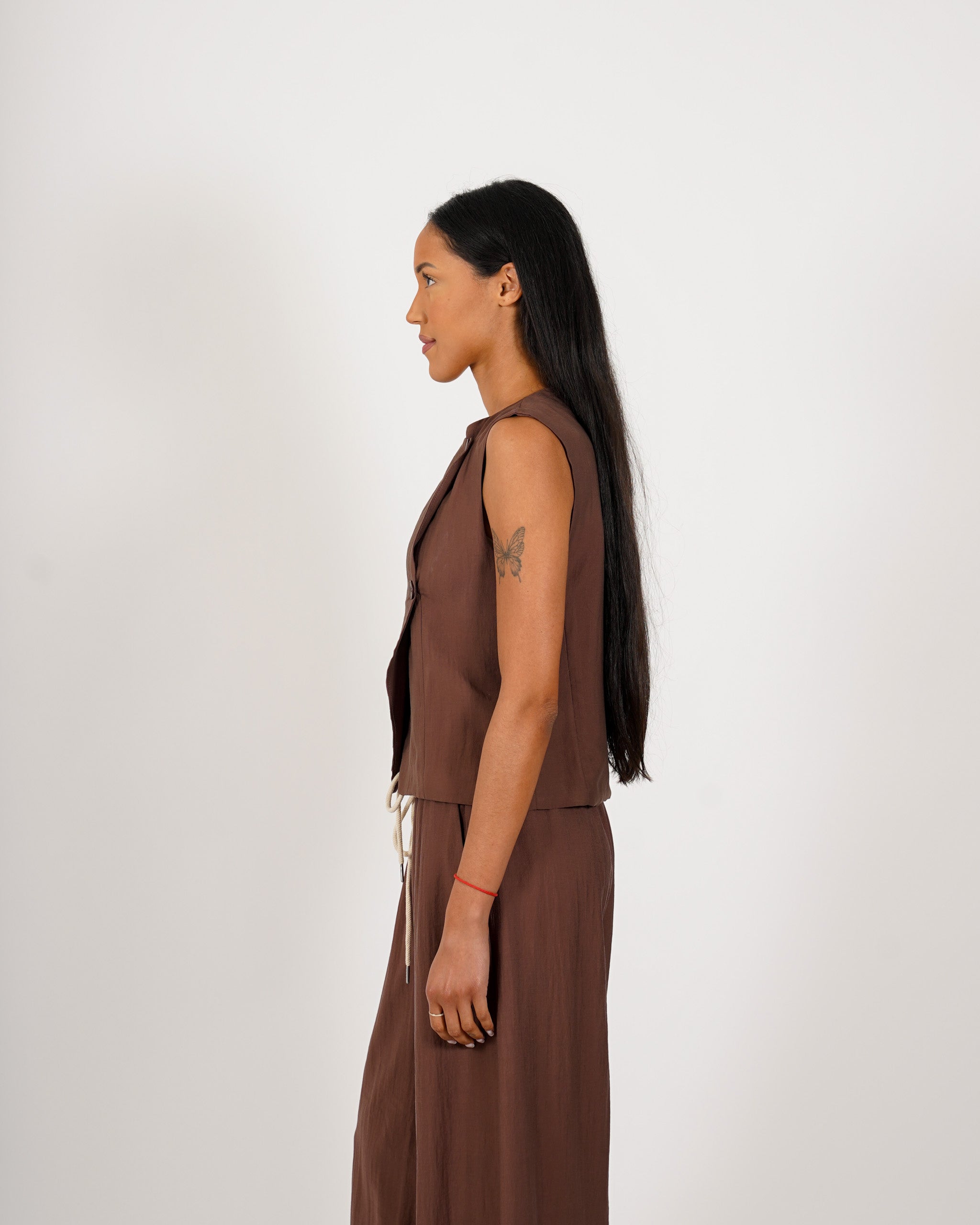 Gilet monopetto con chiusura laterale - Precisa