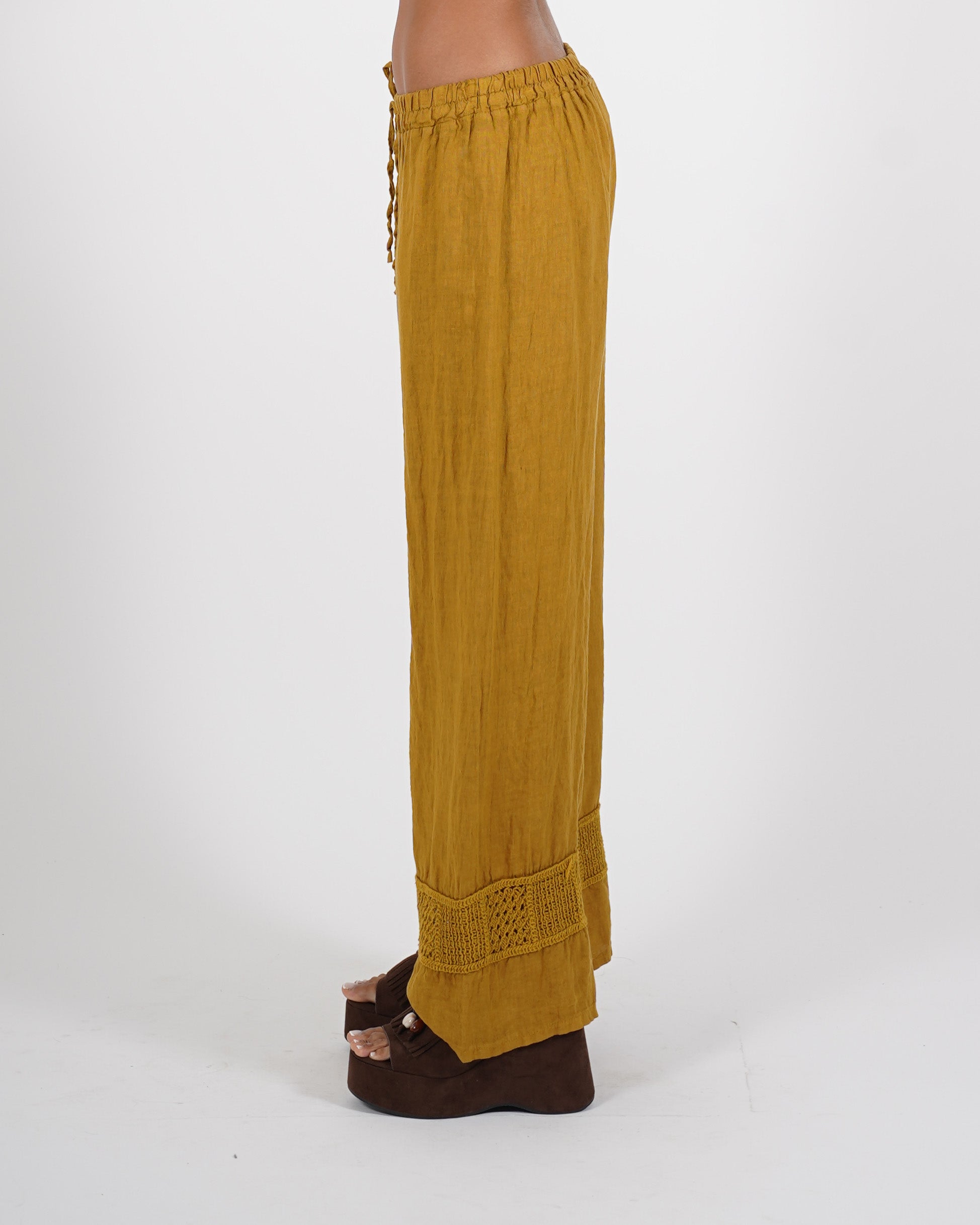 Pantaloni in lino con ricamo sul fondo - Caneira